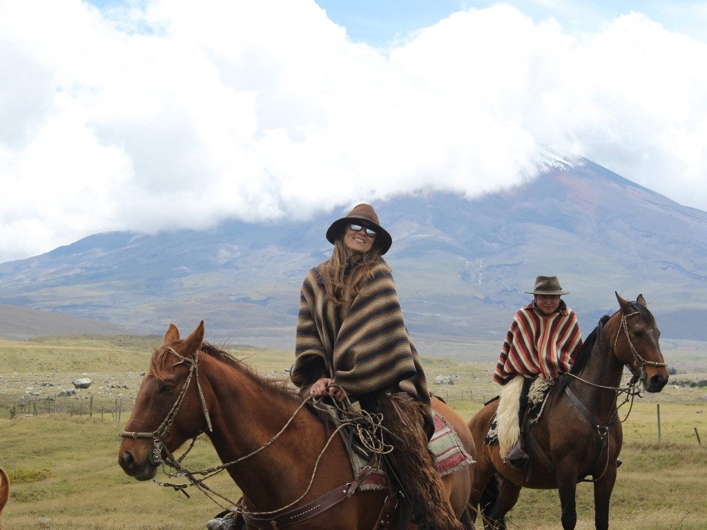 happy traveler around the traveler happy horseback riding.